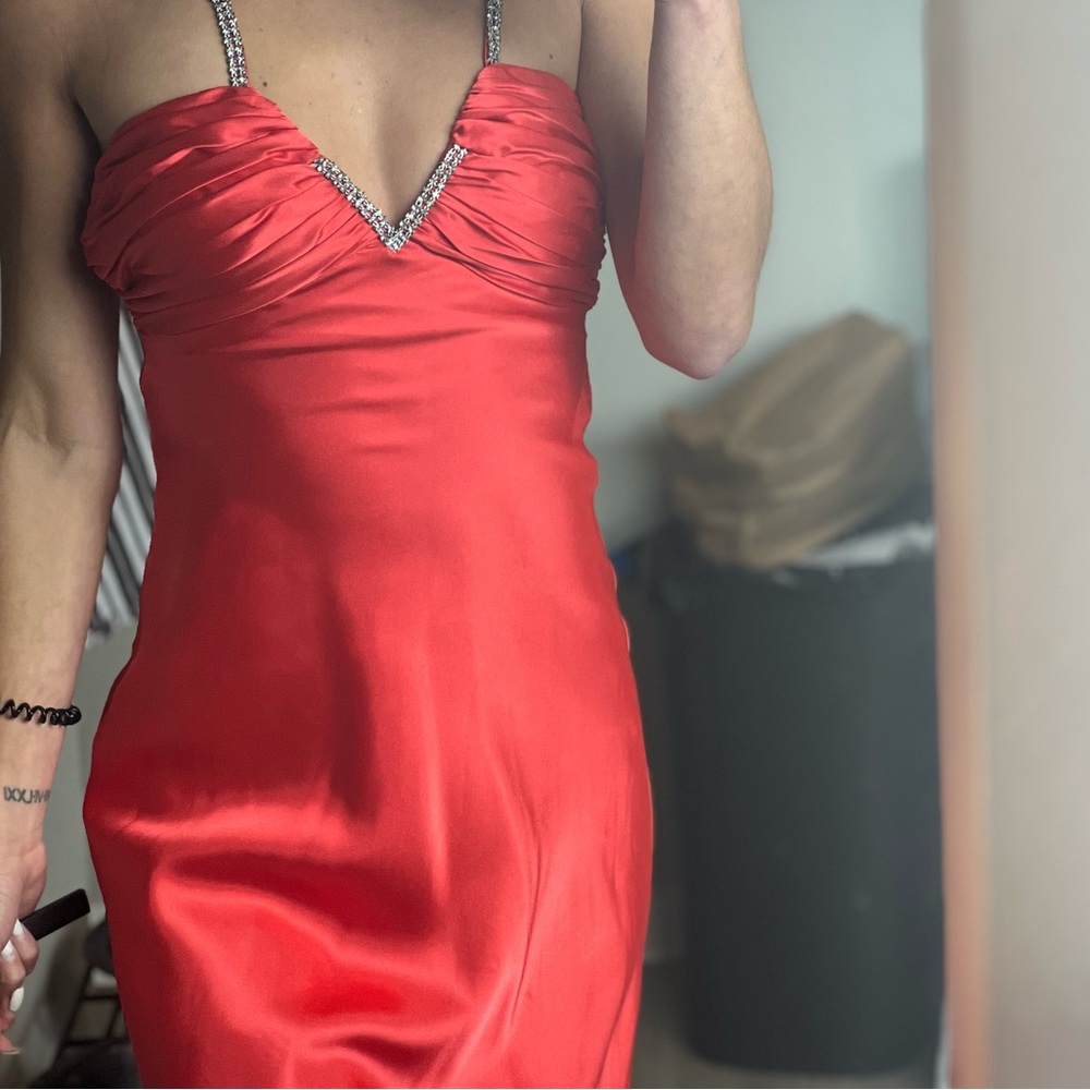 The beautiful satin dress in a size 0